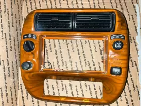 1L5X-3504302-BE FORD Sport Track Center Dash Bezel Wood Grain