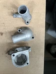 Datsun 280z 620 L-series Engines Nissan Genuine Thermostat Housing Outlet Set. Fixed Price $75.00.